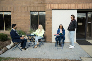 Small group meeting outdoors