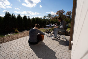 Resident enjoying the outdoor patio